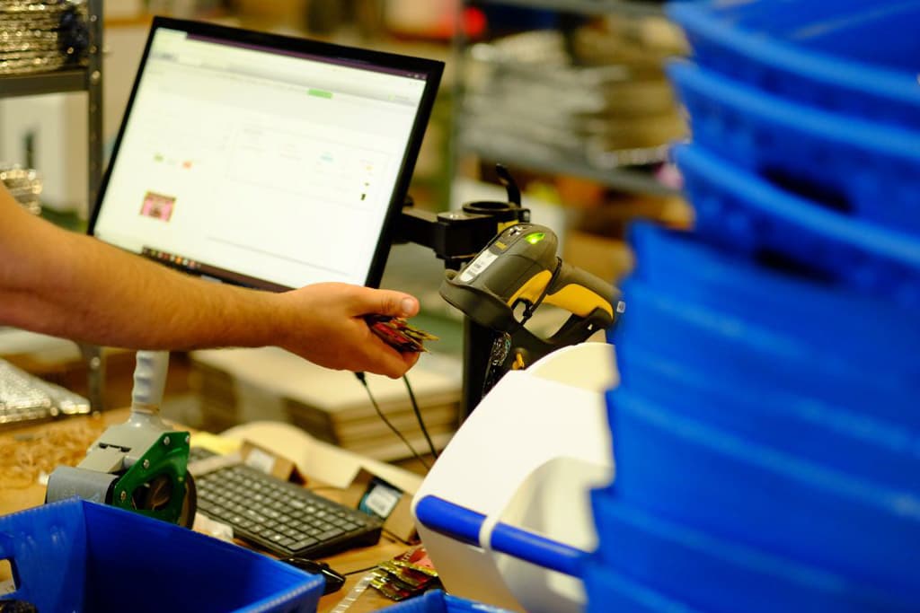 Quality control inspection at KwikShip warehouse